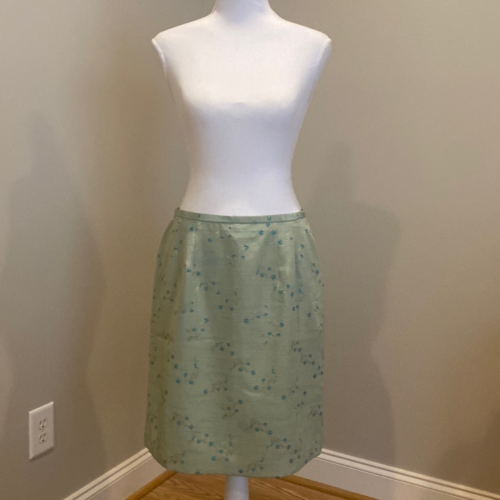 Light green skirt with Blue Embroidered Floral Design and Slight Metallic Sheen